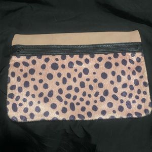 BCBG faux fur cow print clutch